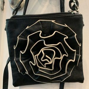 Leather flower crossbody